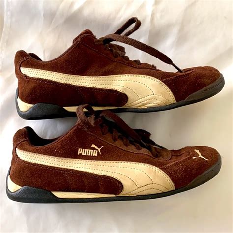 dark brown puma shoes